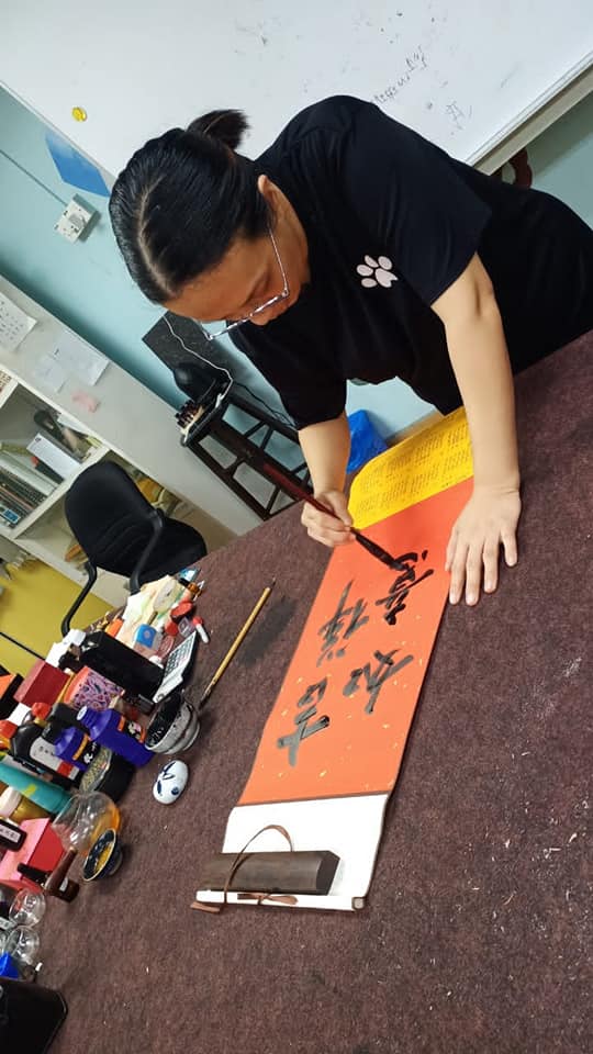 (刊期3月12日)有故事的人:手能写好字,也可做好事