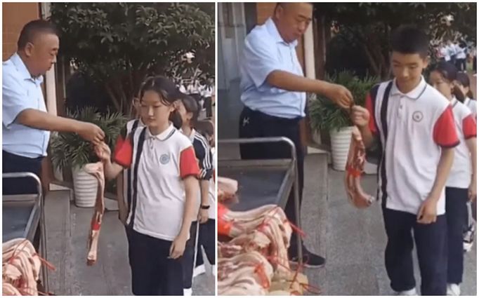 表现优越奖励猪肉 学生领奖笑不出