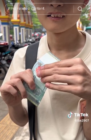 视频|视障青年凭触觉辨别钞票 “RM10面积比RM20宽 RM50较粗糙”
