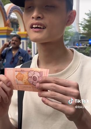 视频|视障青年凭触觉辨别钞票 “RM10面积比RM20宽 RM50较粗糙”