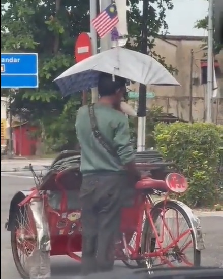 三轮车夫疑当街吸强力胶 网民:会把人载去月球