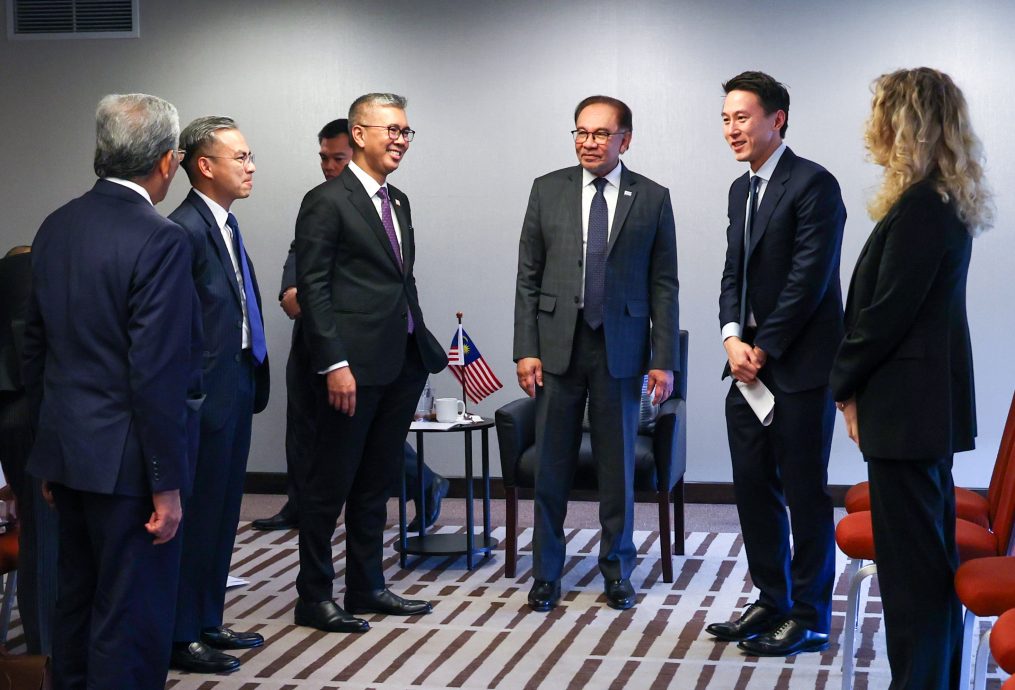 封面副文///科技巨擘晤安华 承诺扩大在马投资
