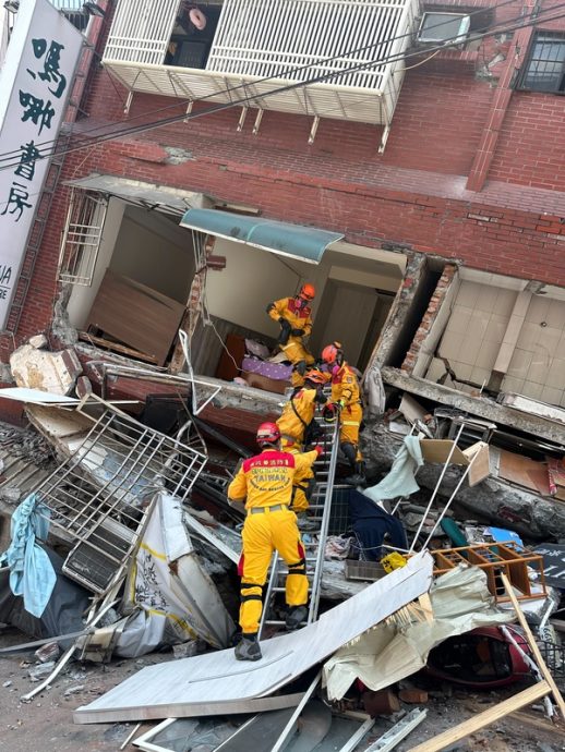天王星大楼救出22人 女老师疑为宠物冲回天王星大楼遭压命危