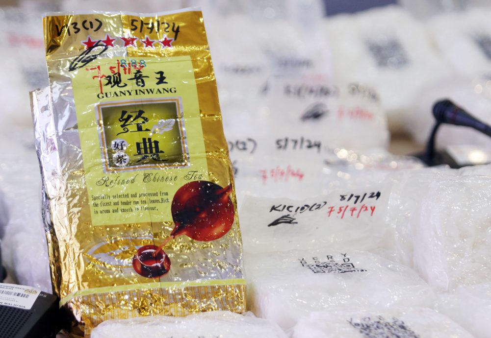 供Newswire/华裔女毒驴租休旅车云运送870万令吉毒品,当场被截查人赃并获