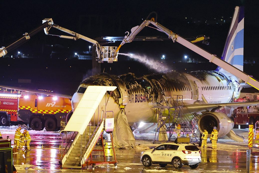 釜山航空机尾失火7伤 传机内置物柜行动电源酿祸