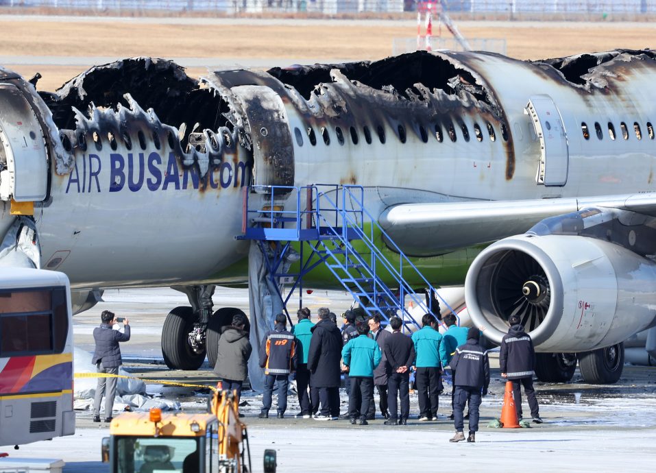 釜山航空机尾失火7伤 传机内置物柜行动电源酿祸