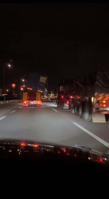 拖车载厢式罗里走大道 倾斜欲坠吓坏人