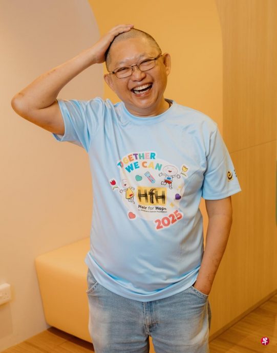 **暖势力**国:暖势力:狮城义工年年落发 让病童不孤单