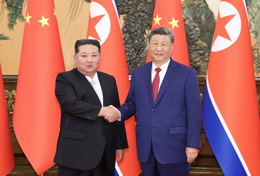 习近平会晤金正恩 双方加强高层交往战略沟通