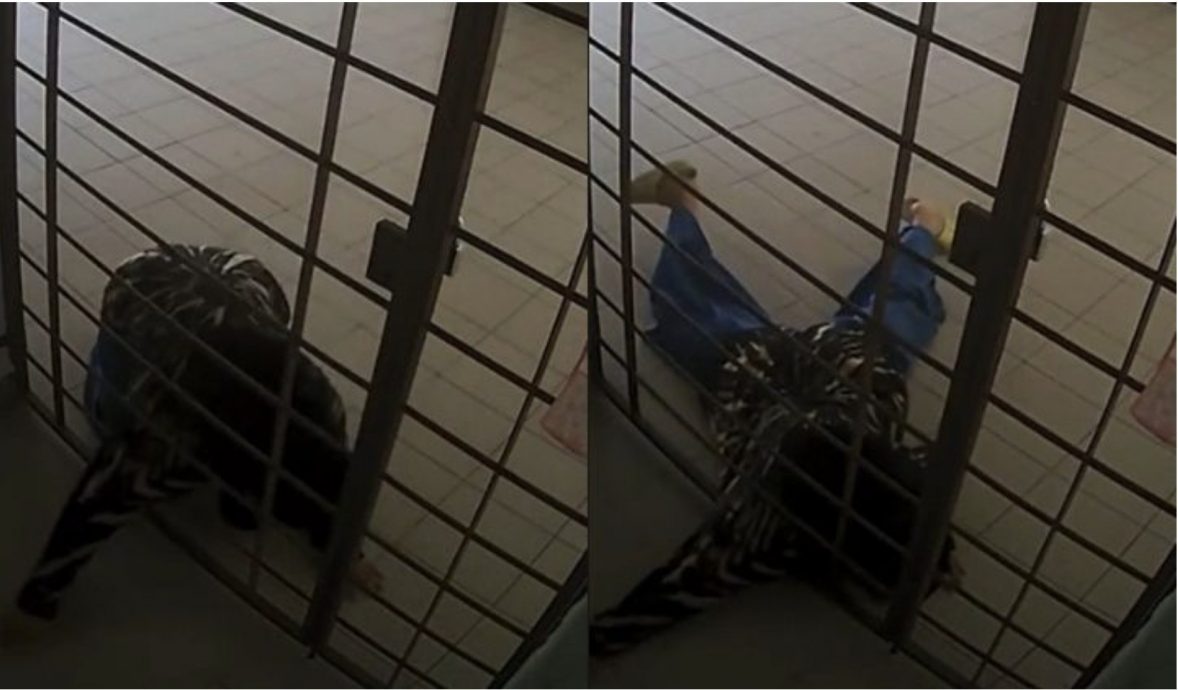 视频|女贼贴地使劲勾包裹 结果只偷到口腔药膏!