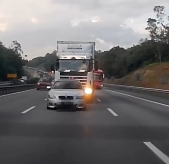 视频|频闪远光灯还插队逼车! 罗里司机危险驾驶挨轰