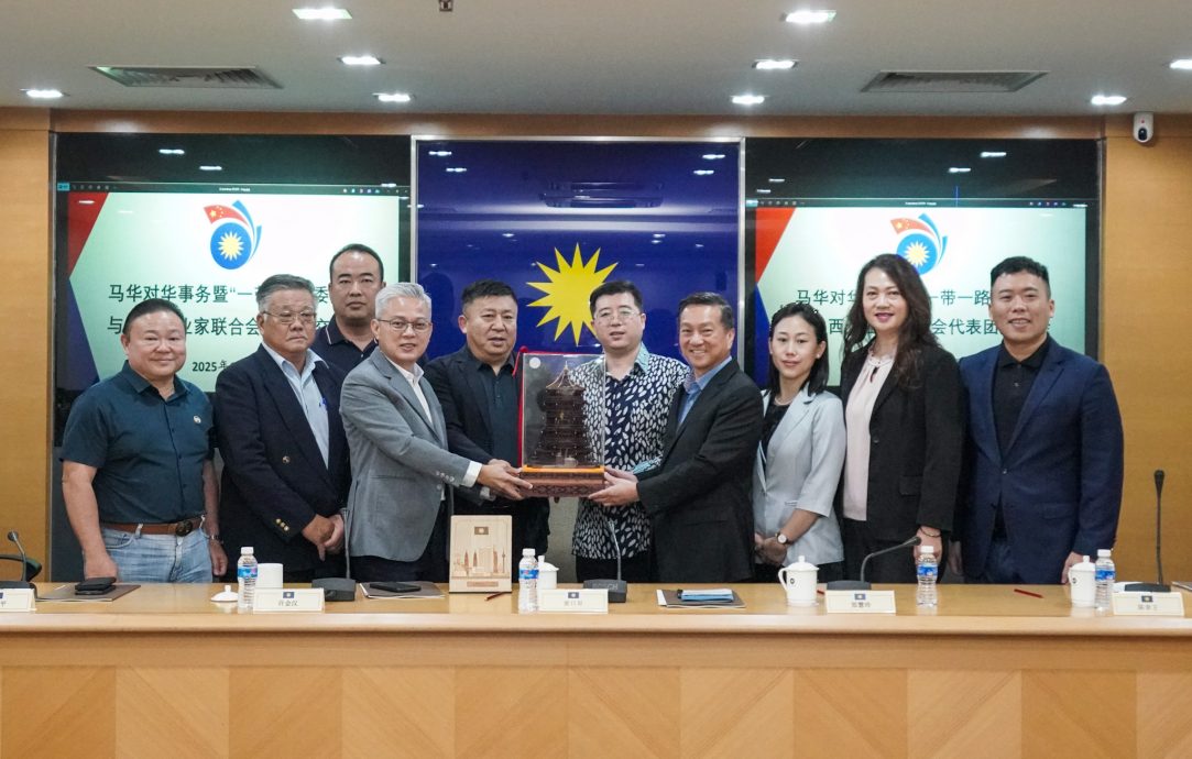 马华对华事务委员会接待山西企业家代表团