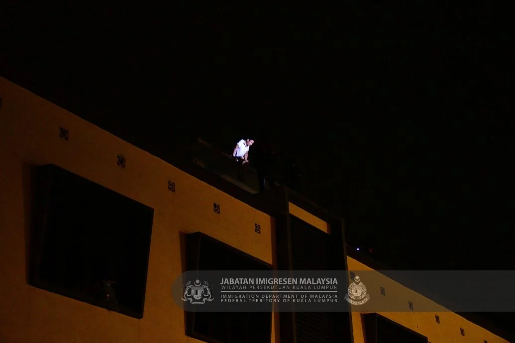 已签发//移民局午夜扫荡半山芭·逮捕186名非法外劳