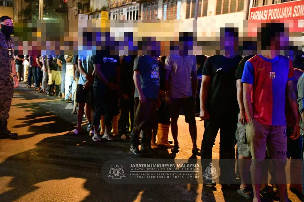 已签发//移民局午夜扫荡半山芭·逮捕186名非法外劳