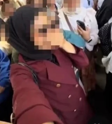 被指旅华捂鼻引网民围剿 女子称将依法追责