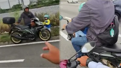 视频 | 摩托没油抛锚大道 暖心交警伸脚推车送父子脱困
