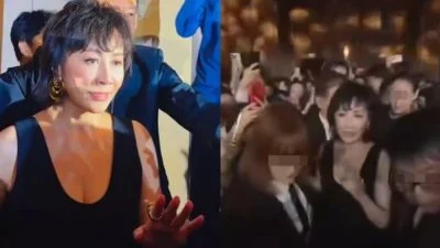 性感亮相抬手护胸挡群众 刘嘉玲被围观罕露惊恐表情