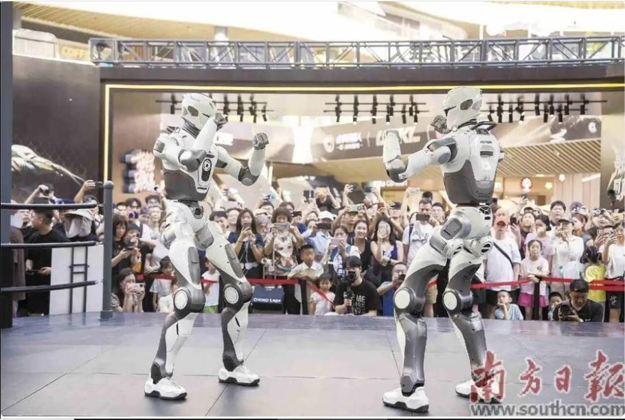 拚图已签)全球首个人形机器人格斗联赛开打