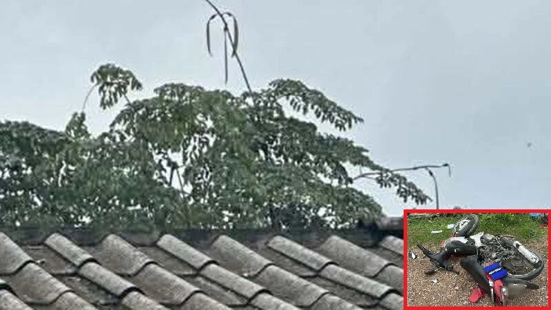 皮卡车与摩托车相撞 女骑士抛飞屋顶身亡